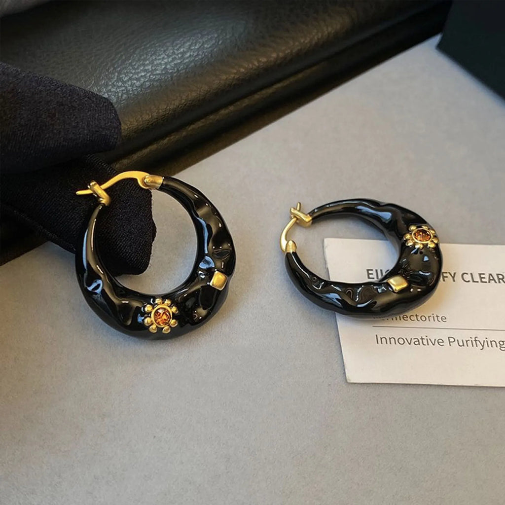 Retro Hong Kong style ear studs with rhinestone inlay and dripping oil textured finish in black and red colours