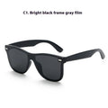 Polarised sunglasses in sand black frame with grey lenses, suitable for outdoor sports and fashion.