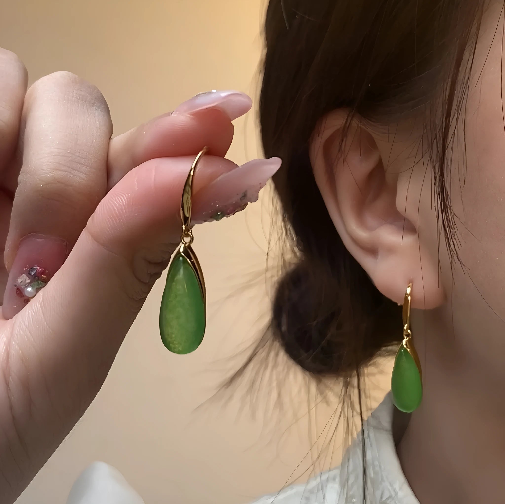 Chinese style geometric earrings with water droplet design in jade colour