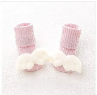 Cotton baby floor socks in blue bow pattern for infants 0-3 months.