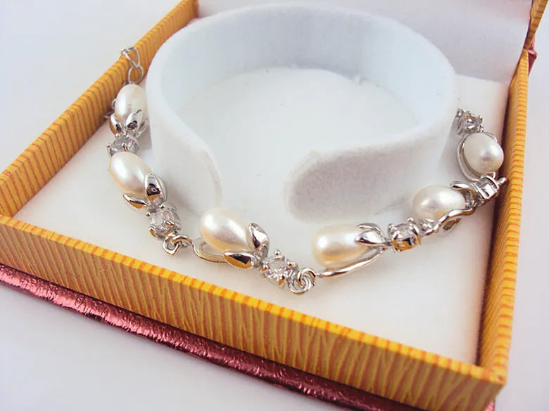 Freshwater pearl bracelet with Korean crown design on white background