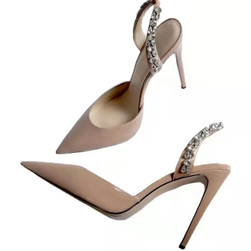 Pointed toe high heel sandals with rhinestone decoration on the side, shown in patent leather red with an 11cm heel.