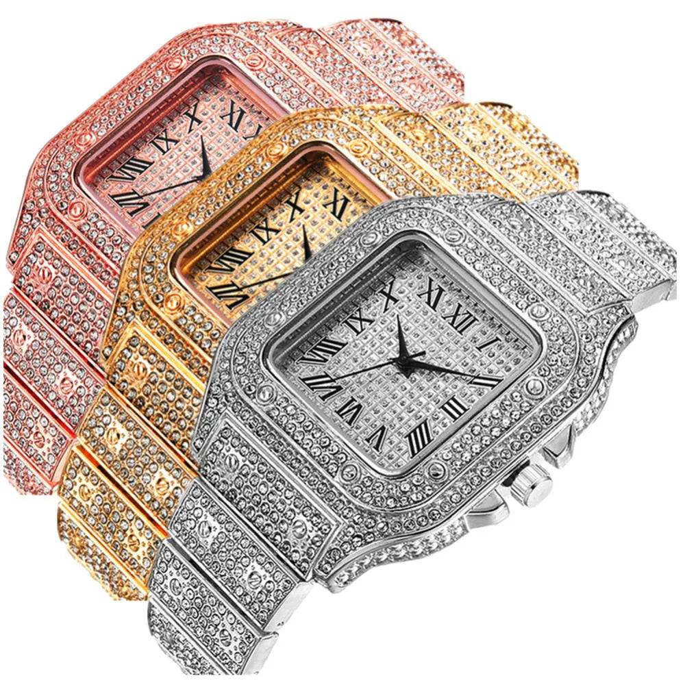 Gold Roman numeral square watch with black mesh band, bracelet, and necklace set on a table.