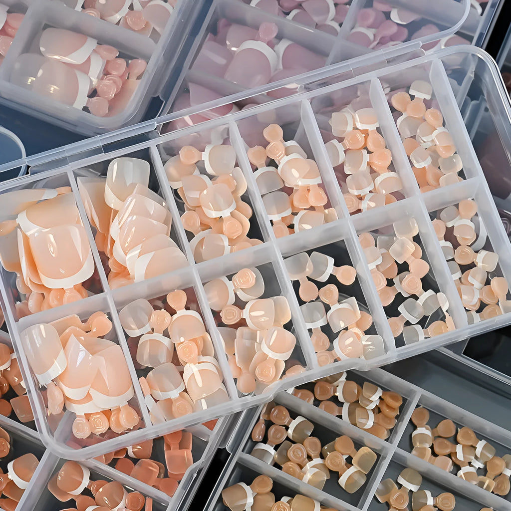Box of 120 French tip artificial toenails in full square short shape with nine nude colour options