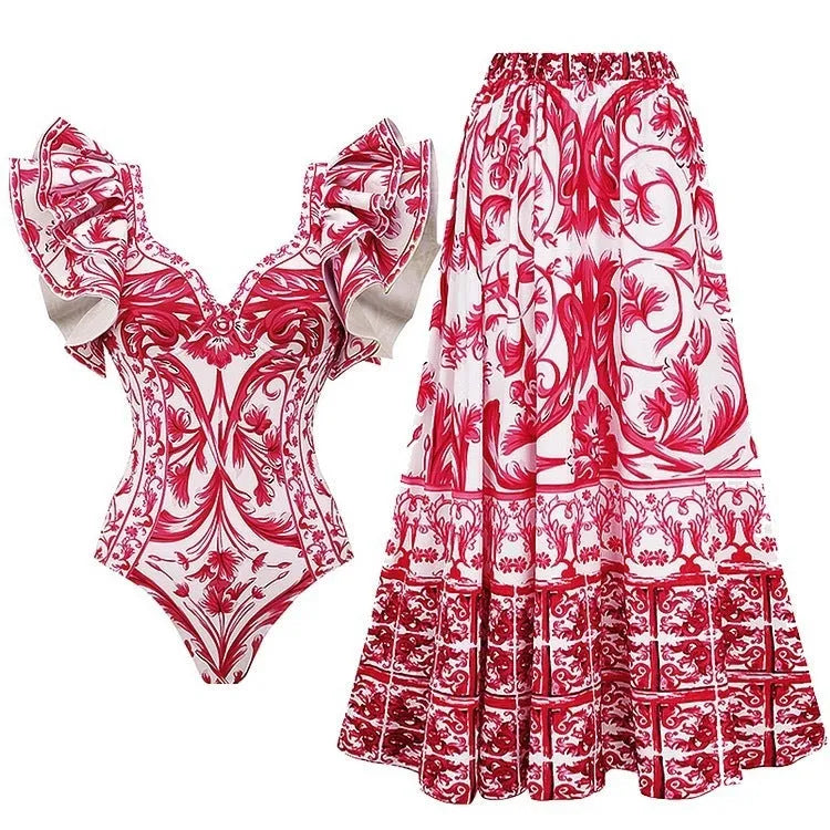 Women's printed one-piece swimsuit in various colours including rose pink, blue, and white.