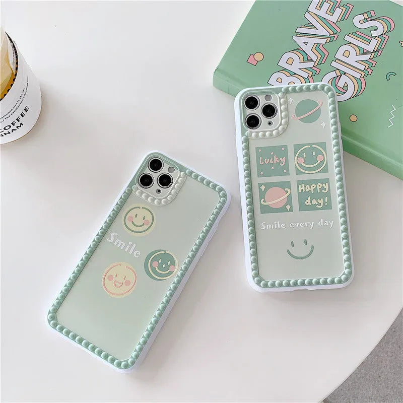 Green iPhone case with geometric polka dot frame and smiley face design for multiple iPhone models