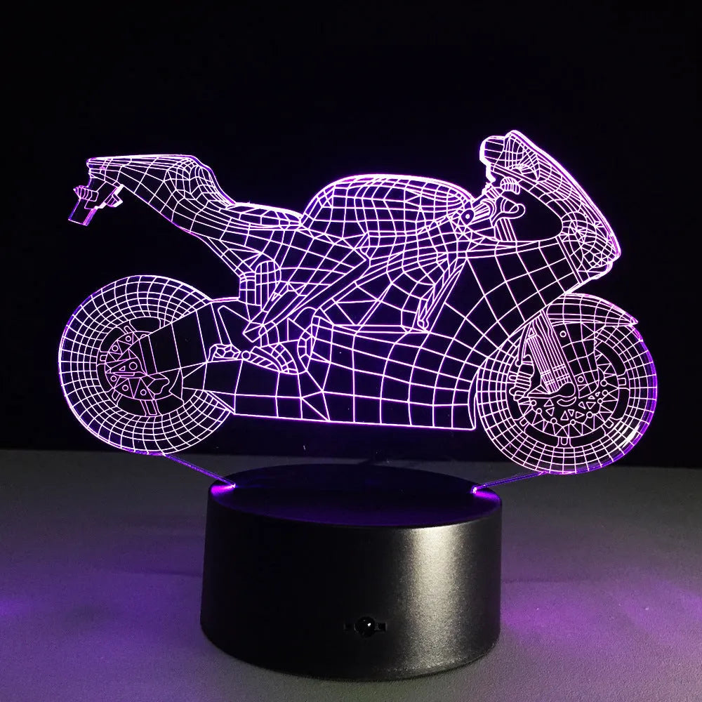 Motorcycle LED desk lamp with black base and acrylic shade on a wooden desk, 220x130x90mm