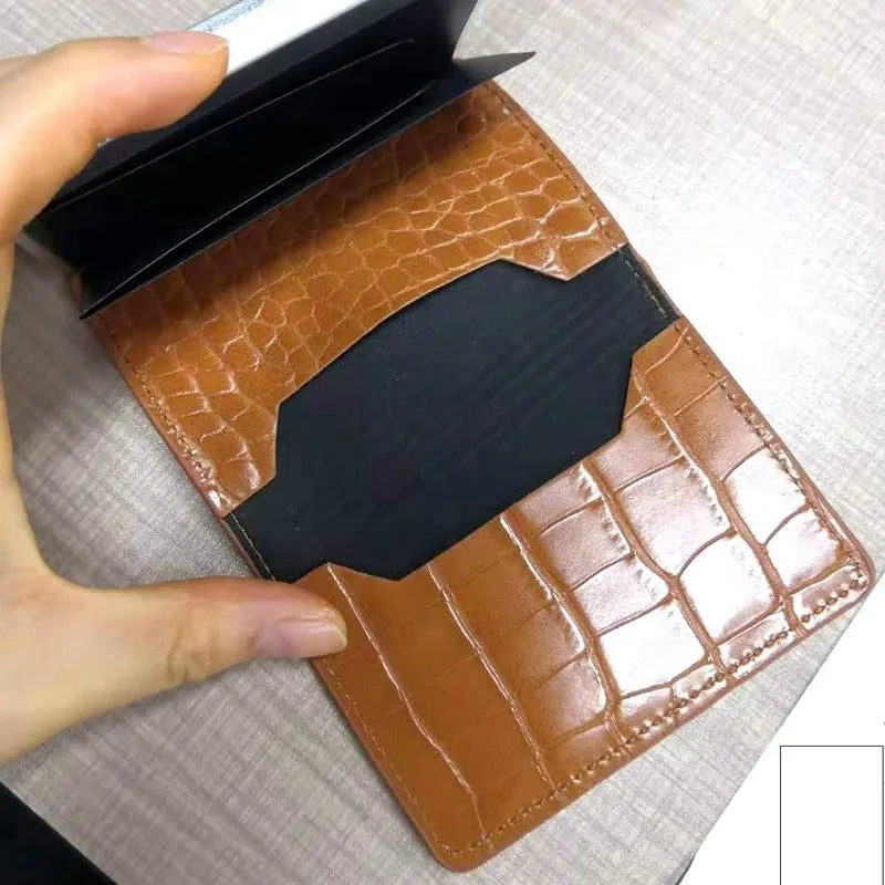 Pattern wallet with metal cartridge automatic pop-up in black polyurethane leather showing card slots
