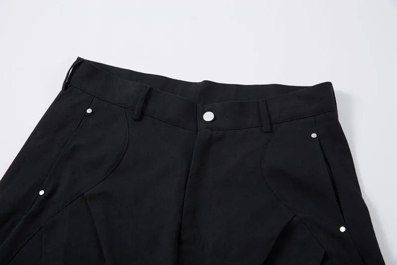 Black men's wide-leg casual trousers with front pleated machete detailing on a mid waist.