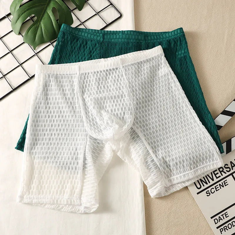 Men's solid colour lace boxer shorts with a lengthened hip-lifting design for shaping.