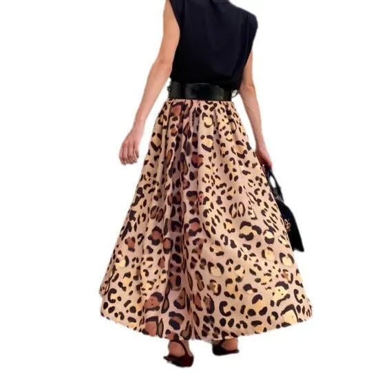 Brown leopard print women's long A-line skirt on a hanger.