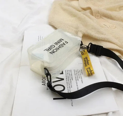 Transparent square jelly shoulder bag with adjustable strap showing internal mobile phone compartment
