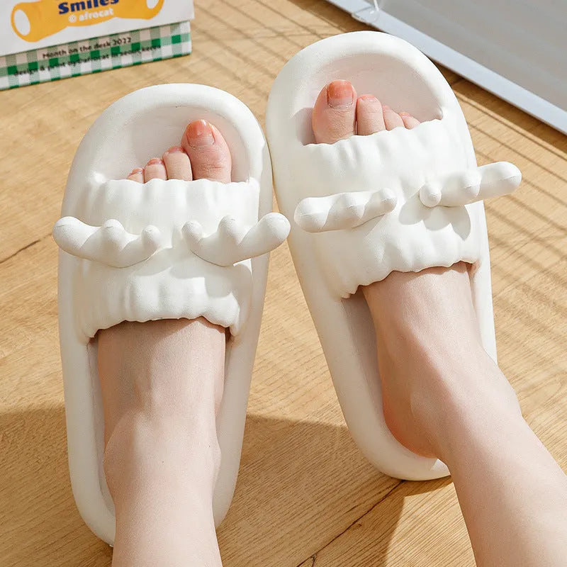 Deer horn design flip flop slippers in EVA material, showing hollow-out upper and non-slip sole.