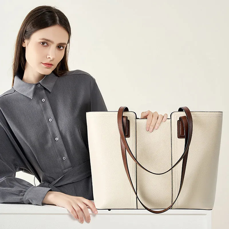 Black genuine leather women's commuter shoulder bag with horizontal square shape and single shoulder strap