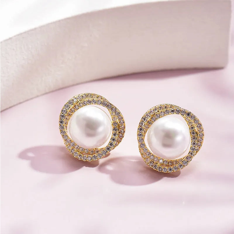 Diamond rose pearl stud earrings in white gold colour with rhinestone inlay on copper base