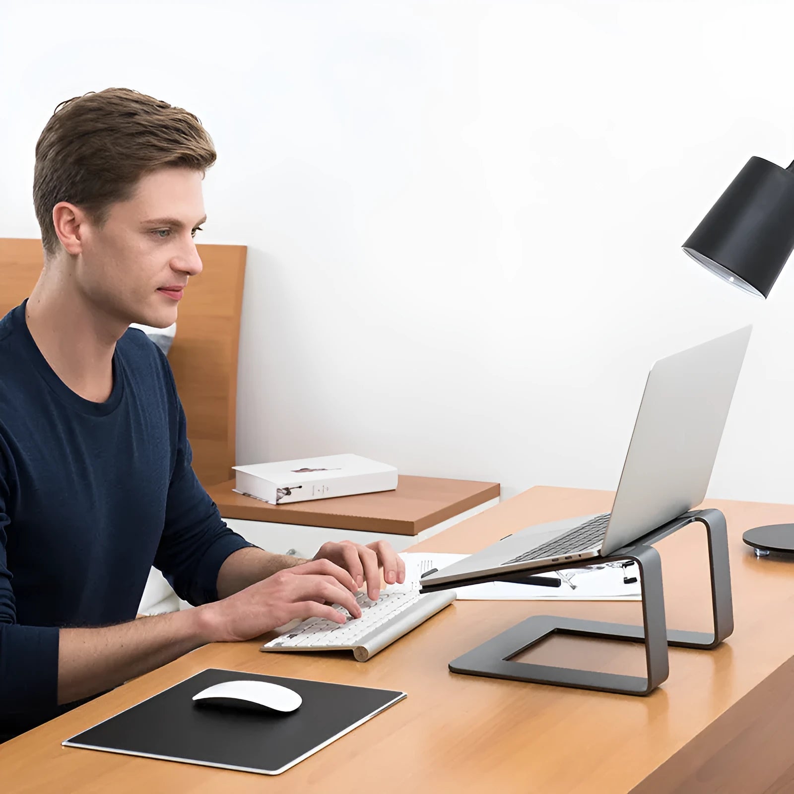 Aluminium alloy laptop stand riser in black or silver with 18.5cm height and non-slip silicone pads