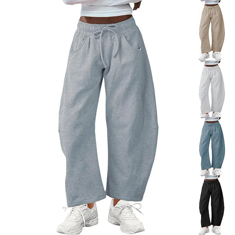 Loose cropped sweatpants with drawstring waist in cotton blend fabric for streetwear fashion