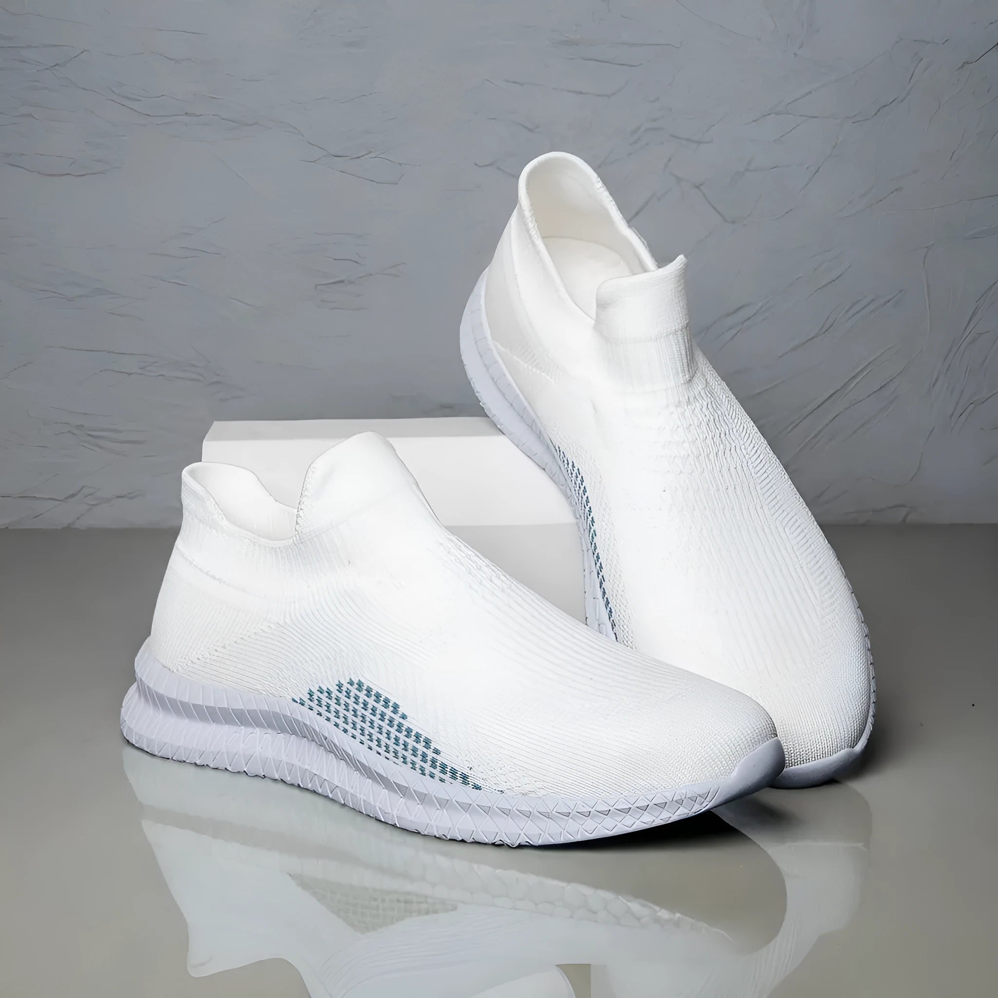 Men's white, black, and blue fabric flyknit low-top casual sneakers with round toe on a plain background