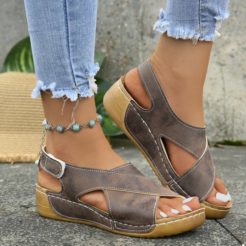 Roman platform wedge sandals with Velcro strap in coffee colour on a rubber sole.