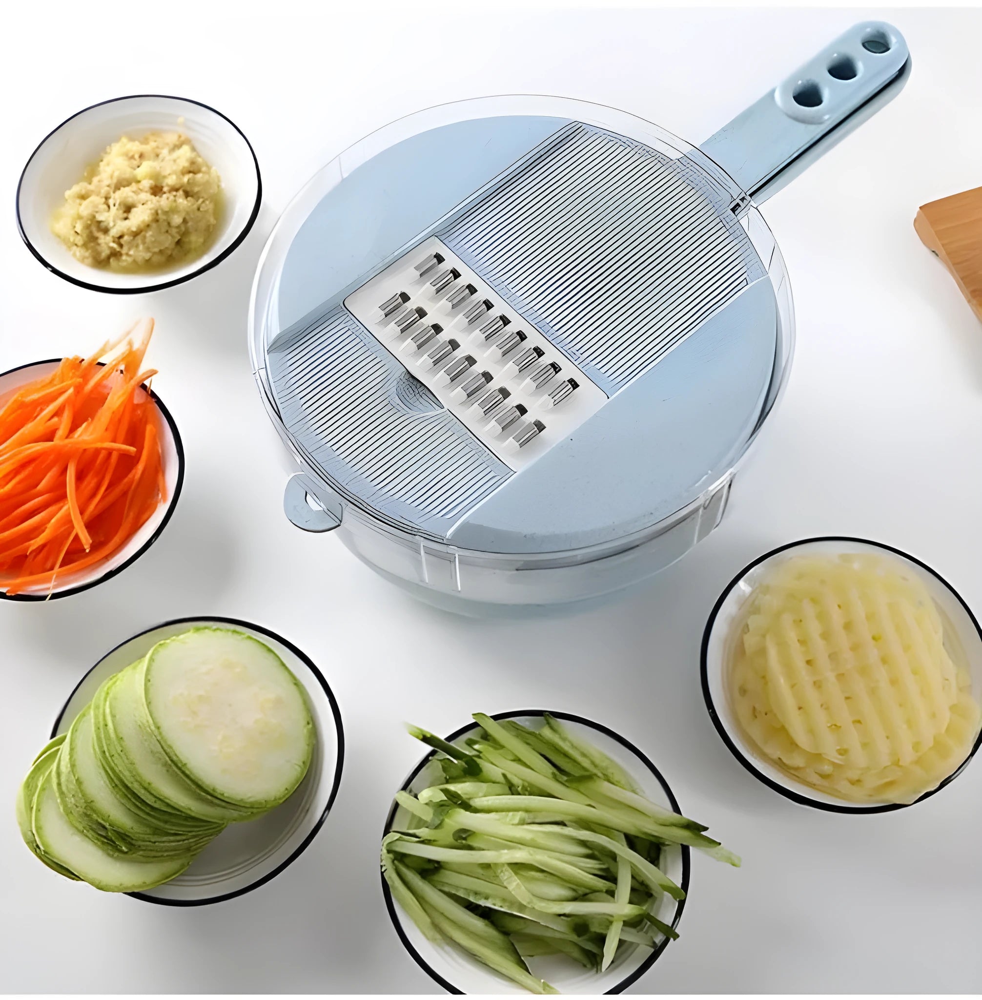 8-in-1 mandoline vegetable slicer with stainless steel blades and blue plastic body on kitchen counter
