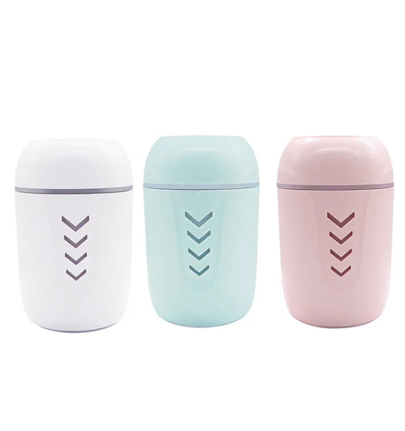 X3 portable car humidifier with columnar shape in blue, pink, or white colours showing USB port