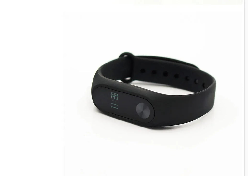 Xiaomi Mi Band 2 black fitness tracker with OLED display showing heart rate reading
