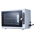 Small silver UV sterilizer with stainless steel chamber for salon tool sanitation