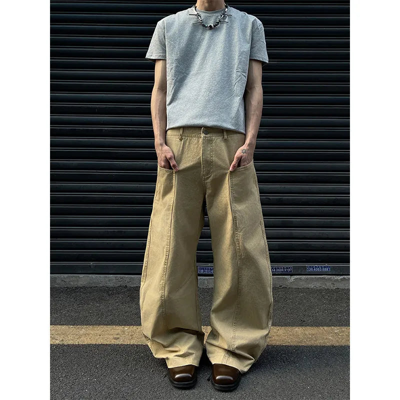 Men's khaki straight-leg cotton trousers laid flat, showing casual American retro style.