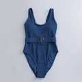 Navy blue women's one-piece swimsuit with chest padding and slim triangle design
