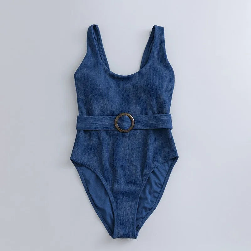 Navy blue women's one-piece swimsuit with chest padding and slim triangle design