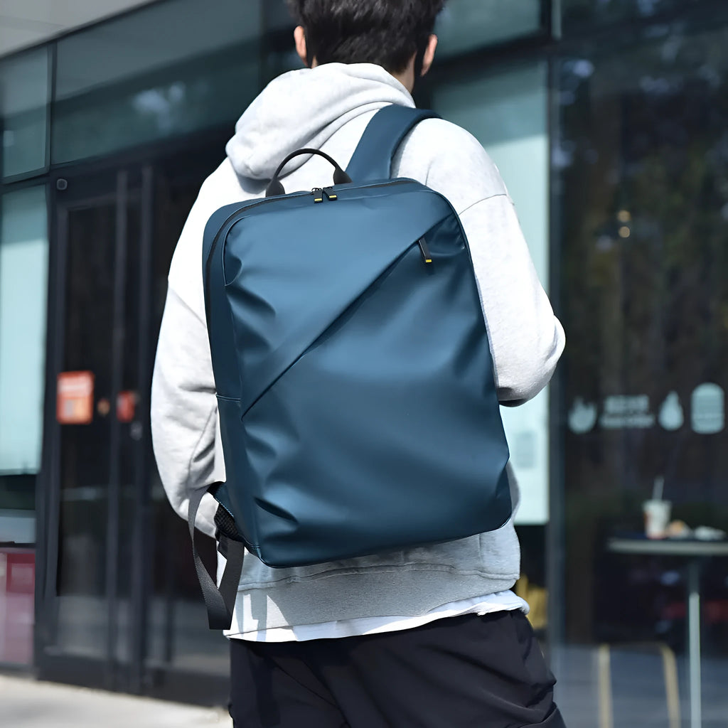 Black waterproof PU leather backpack for men with large capacity and computer compartment