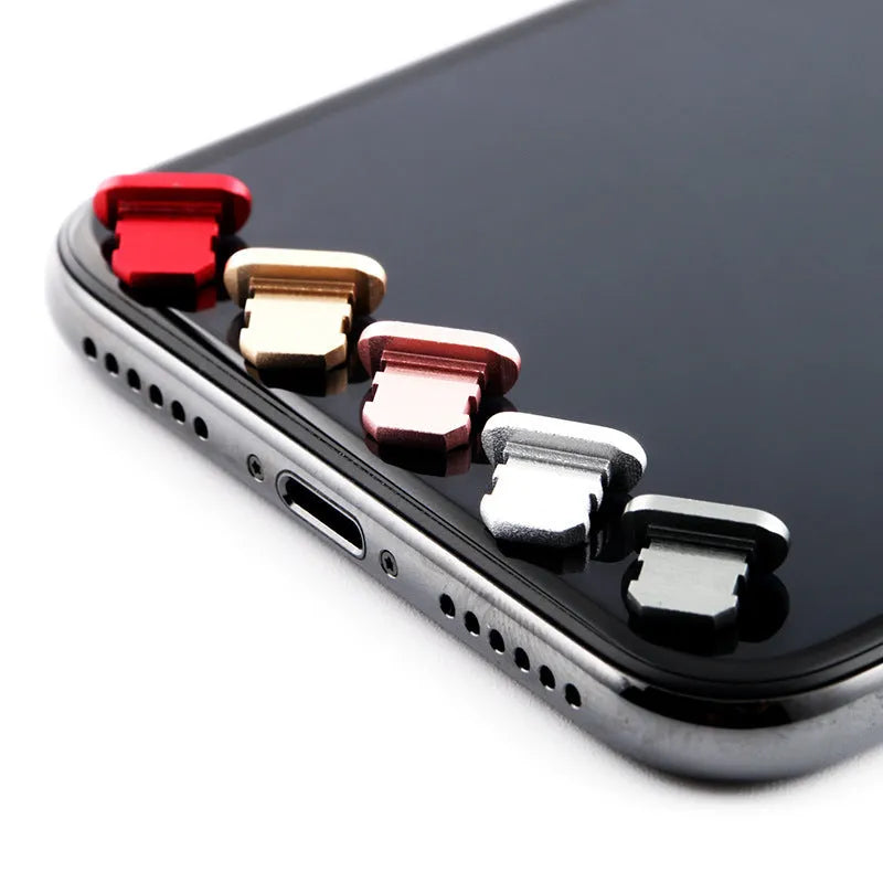 Aluminium alloy iPhone charging port dust plug shown in various colours including gold, silver, blue, and rose gold.