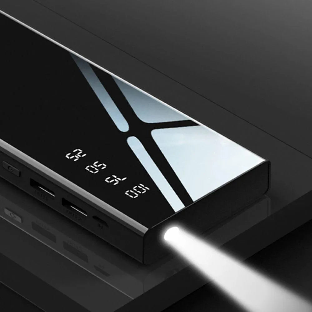 20000mAh portable power bank with LCD screen, dual USB ports, and LED torch in black, red, or white.