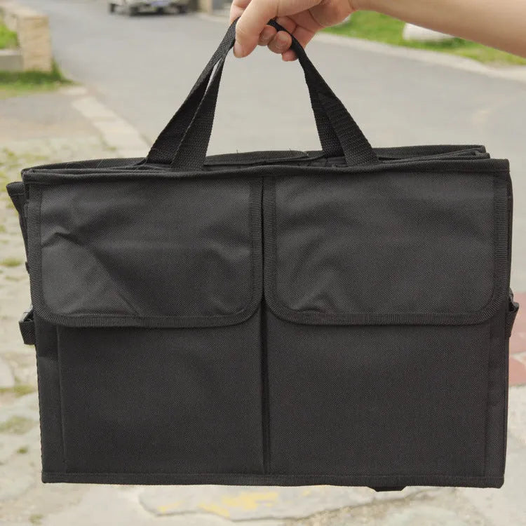 Black non-woven car boot storage organiser folded measuring 40cm by 26cm
