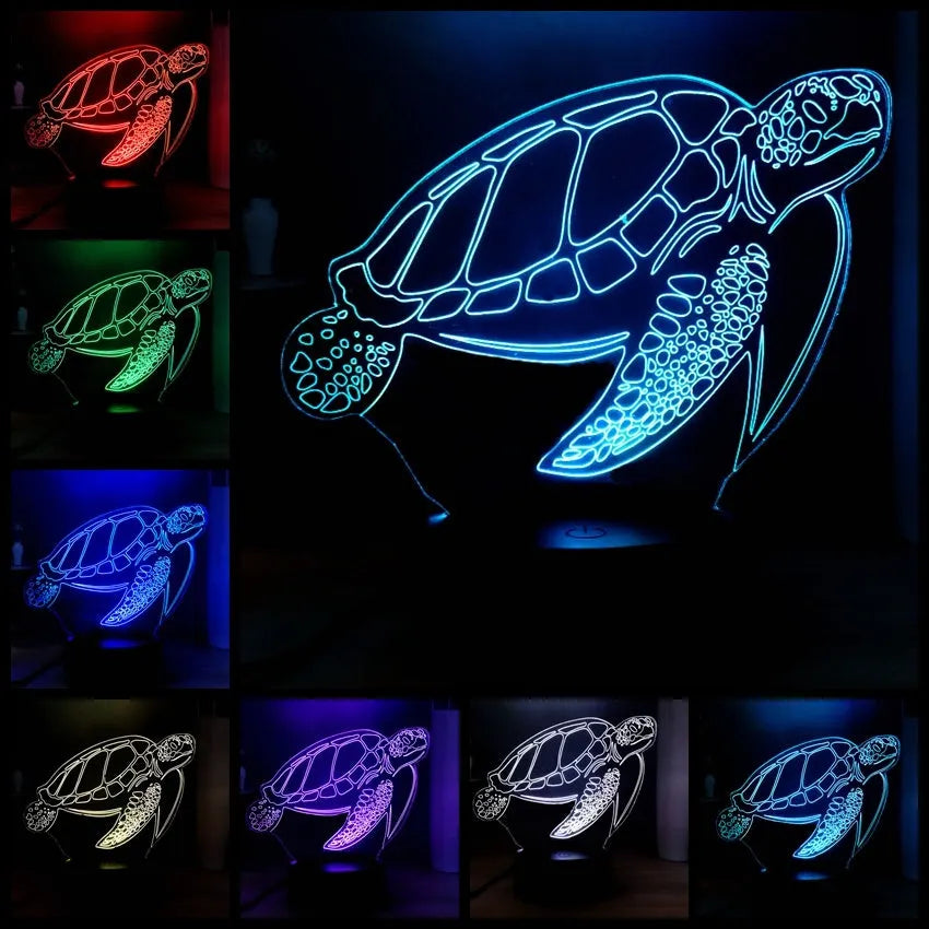 3D acrylic turtle-shaped night light glowing with multi-coloured LED light.