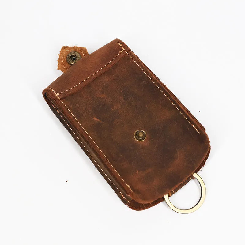 Crazy Horse leather key case in dark brown with keys inserted, measuring 7 cm by 11.5 cm
