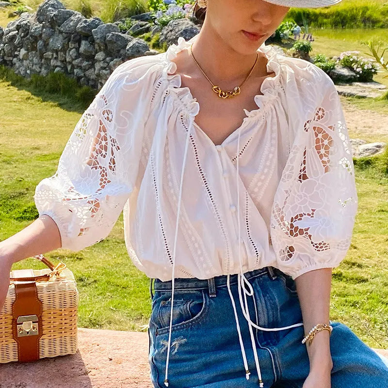 Women's white floral cotton two-piece set with embroidered sleeveless top and midi skirt