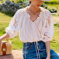 Women's white floral cotton two-piece set with embroidered sleeveless top and midi skirt