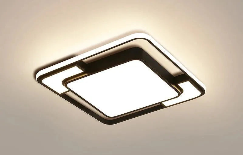 White square LED ceiling lamp with iron and PVC construction, 42cm wide.