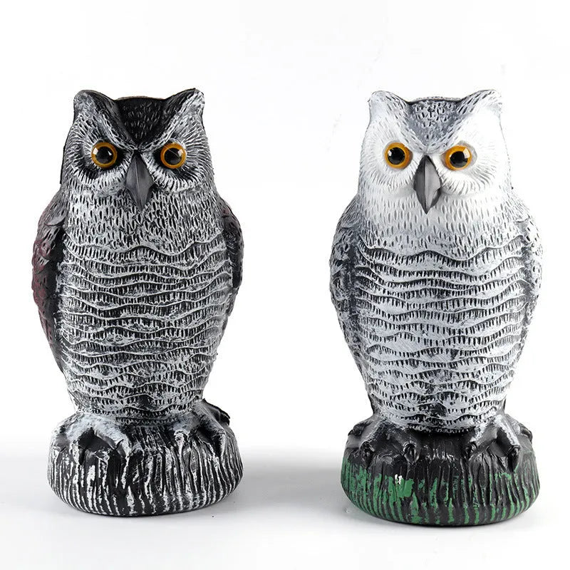 Three artificial plastic owls in red or white for garden pest control, each 20cm tall