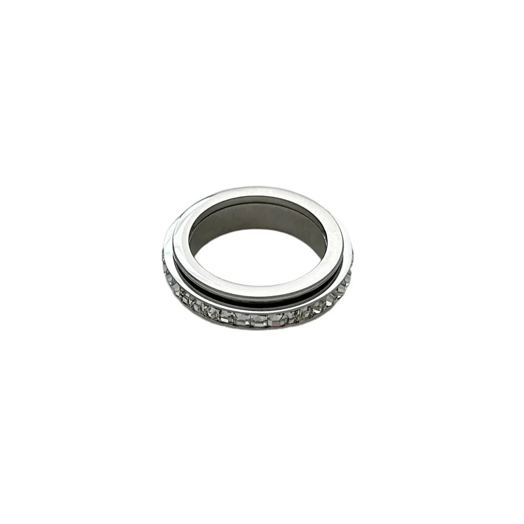 Titanium steel rotatable ring with starry sky design in gold electroplate finish on a dark background