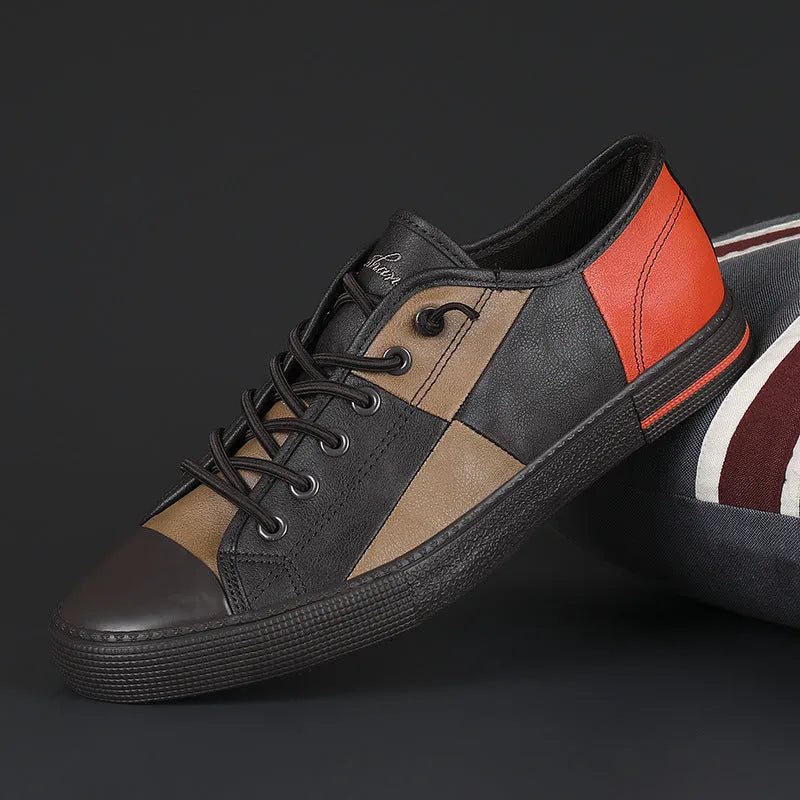 Men's leather shoes with elastic band fastening in black and white colour combination with rubber soles