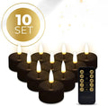 Four black S10 LED tealight candles showing flickering flame effect