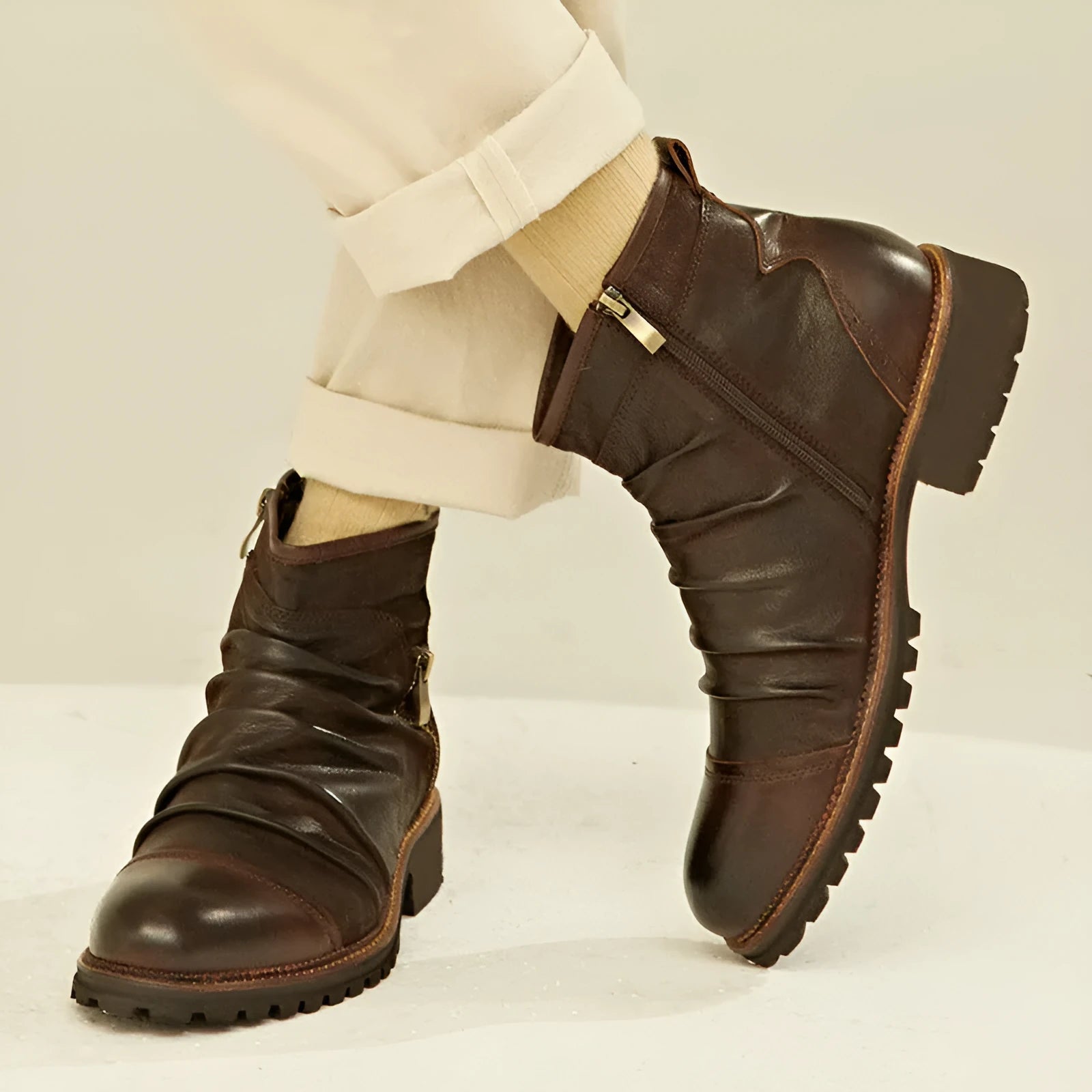 Mid-calf black cowboy boots with side zipper and embossed leather-like finish