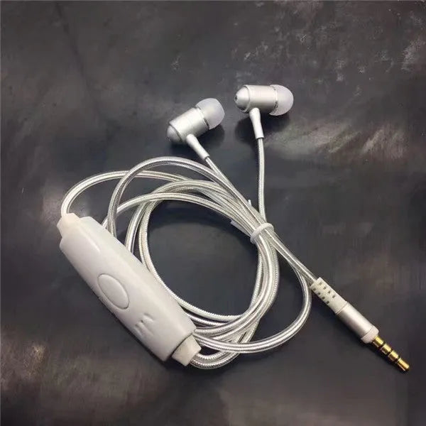 Blue LED light up earphones with 3.5mm plug and inline remote control on a dark background.
