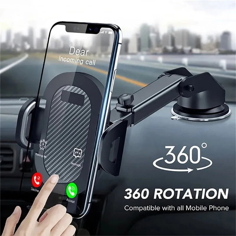 Black universal car phone holder mounted on a dashboard, gripping a large smartphone.