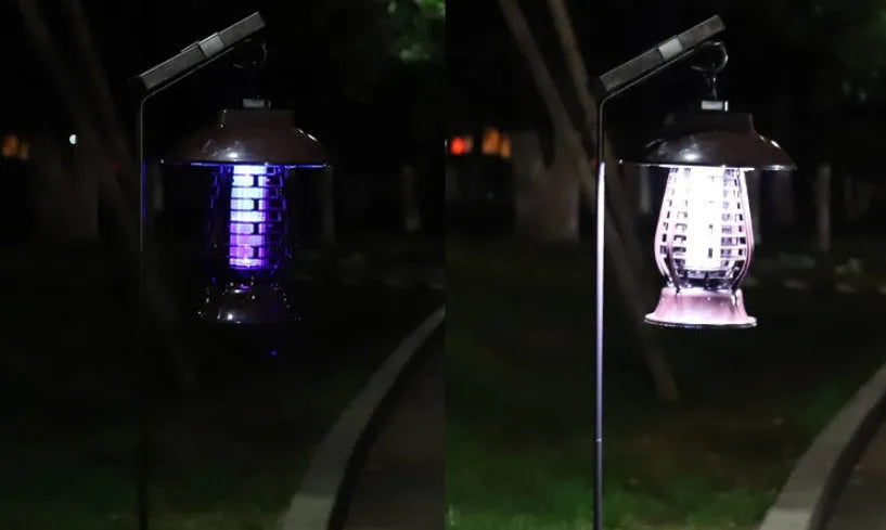White solar-powered electronic mosquito lamp with solar panel and purple switch for garden outdoor use.