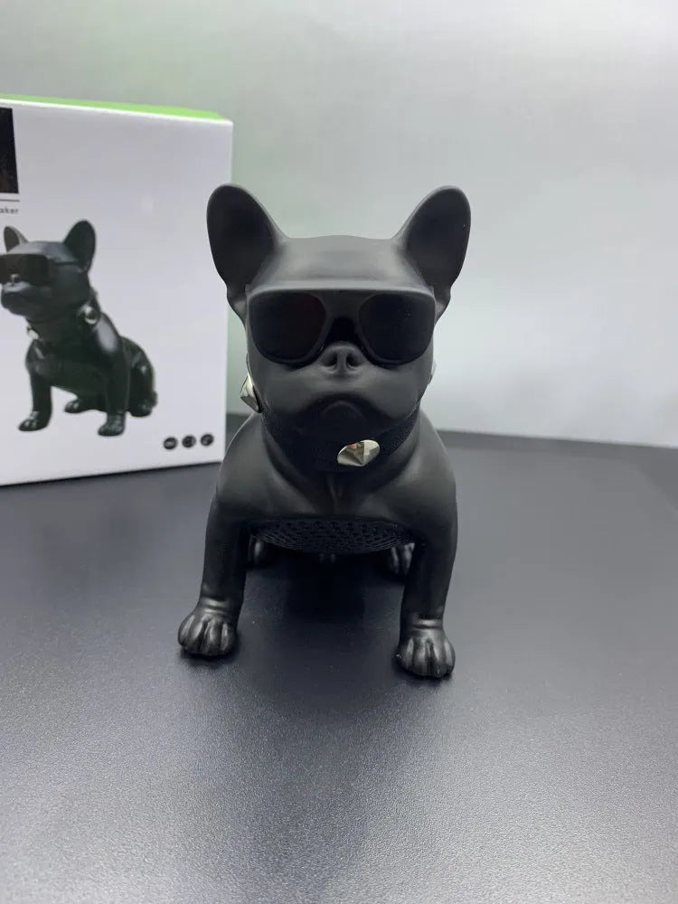 Mini Bluetooth speaker shaped like a bulldog, shown in black, red, and white colour options.