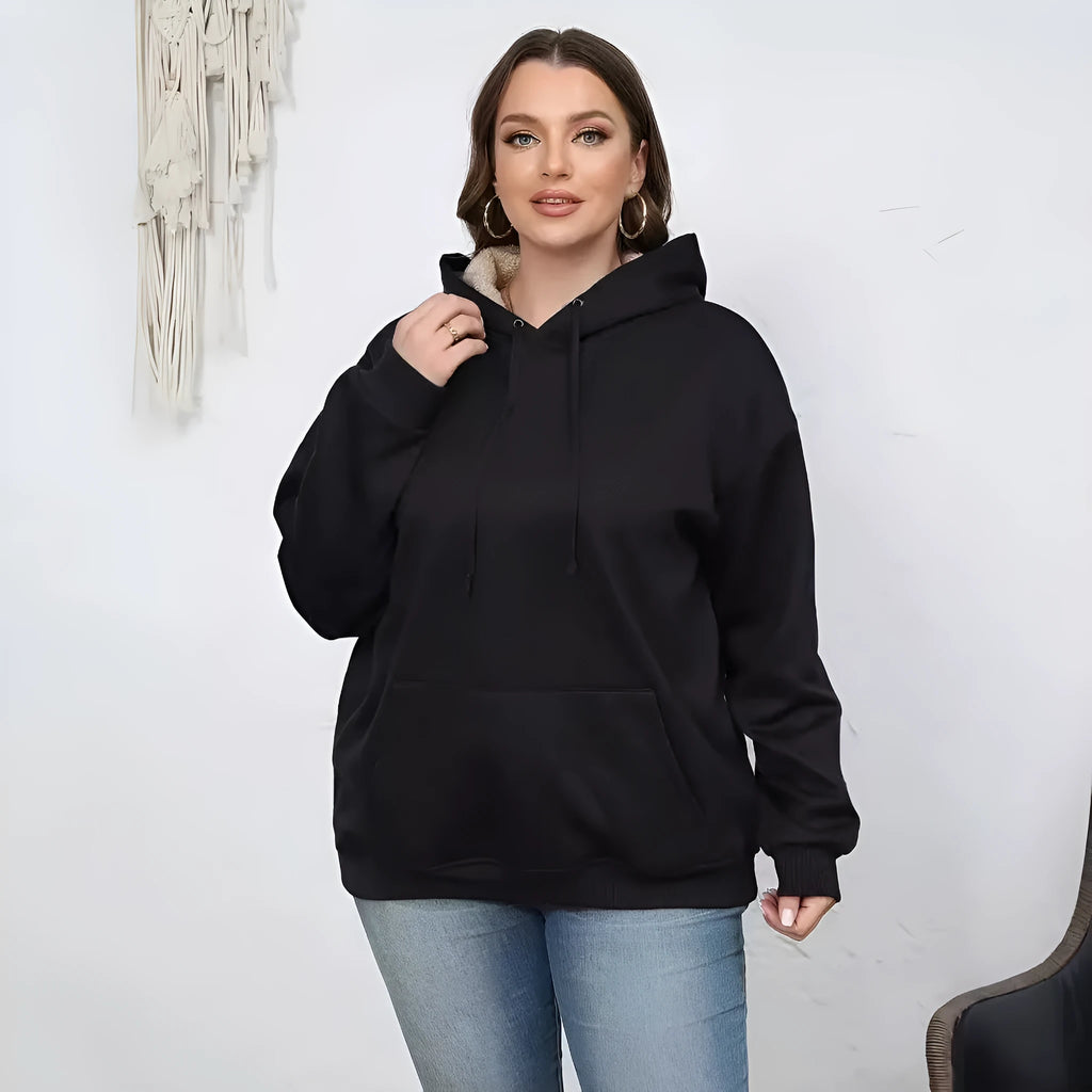 Women's black hooded sweater with a raised 3D pattern, featuring a loose fit and long sleeves.