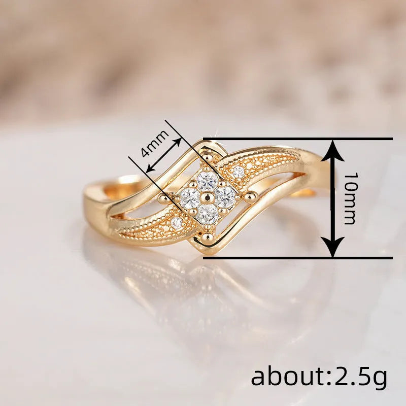 Women's geometric copper ring with micro inlaid zircon details in yellow gold colour.